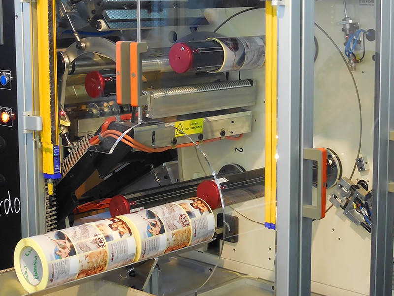 Ejes de listones cantilever en máquina de etiquetas