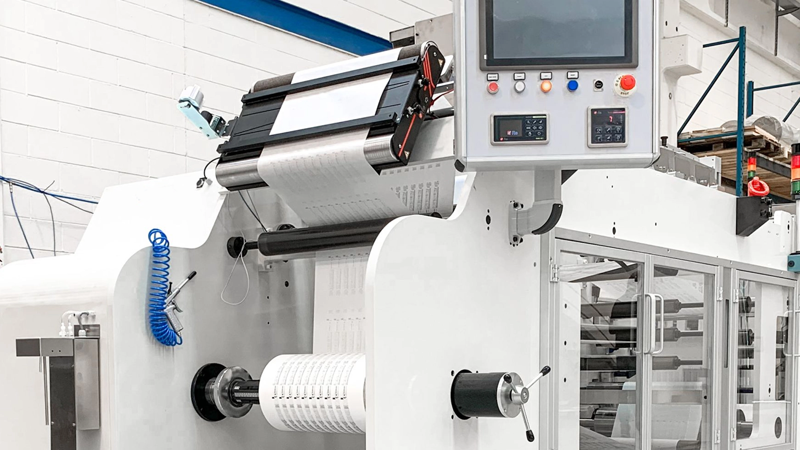 Web guiding system on converting line